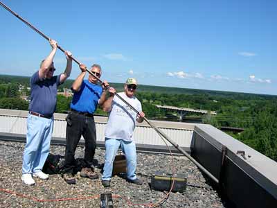 Raising the antenna.